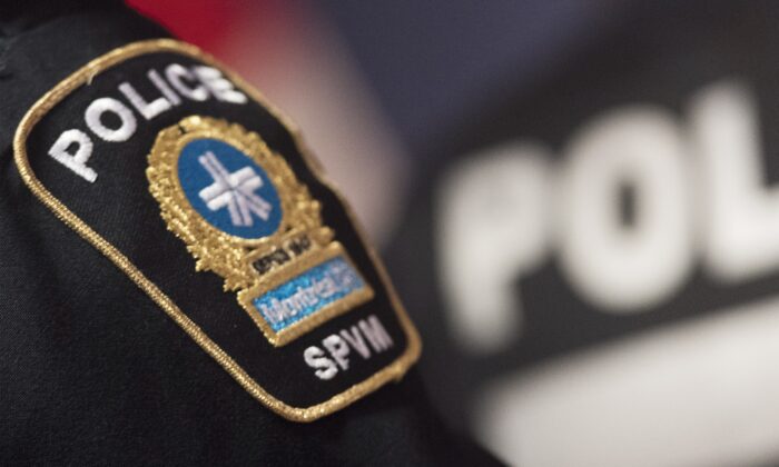 A Montreal Police badge is shown during a news conference in Montreal on Oct. 7, 2019. (The Canadian Press/Graham Hughes)