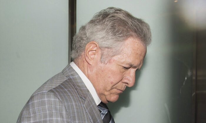 Businessman Tony Accurso arrives at the courthouse for sentencing in Laval, Que., July 5, 2018. (The Canadian Press/Graham Hughes)