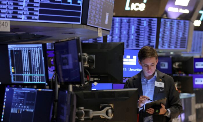 A trader works on the trading floor at the New York Stock Exchange (NYSE) in Manhattan, New York City, on May 20, 2022. (Andrew Kelly/Reuters)