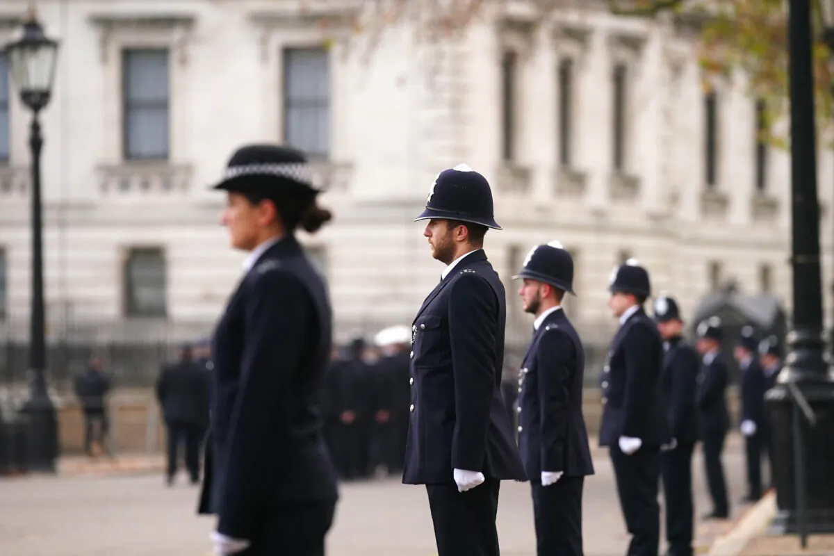 Police officers line up ahead of a memorial service to remember and celebrate the life of Metropolitan Police Sergeant Matt Ratana at The Royal Military Chapel in Westminster, London, on Nov. 29, 2021. (PA Media)