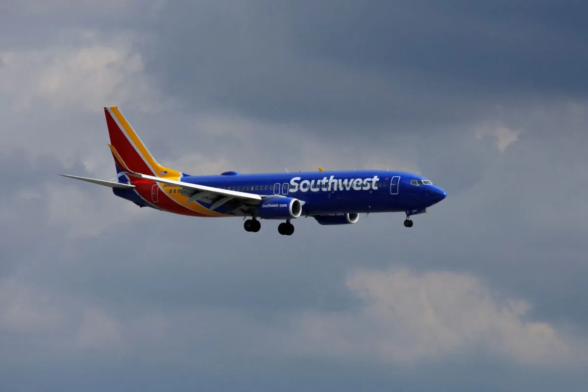 A Southwest Airlines commercial aircraft approaches John Wayne Airport in Santa Ana, Calif., on Jan. 18, 2022. (Mike Blake/Reuters)