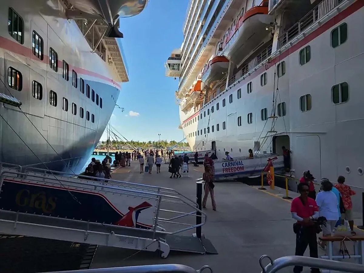 Guests from both the Carnival Freedom and Mardi Gras cruise ships went ashore as scheduled on Grand Turk on May 26, 2022, despite a fire in Freedom's funnel earlier in the morning. (Carnival Cruise Line/TNS)