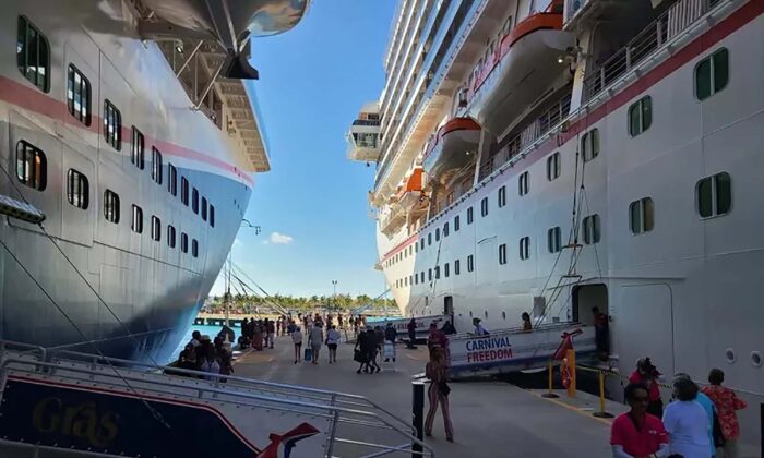Guests from both the Carnival Freedom and Mardi Gras cruise ships went ashore as scheduled on Grand Turk on May 26, 2022, despite a fire in Freedom's funnel earlier in the morning. (Carnival Cruise Line/TNS)