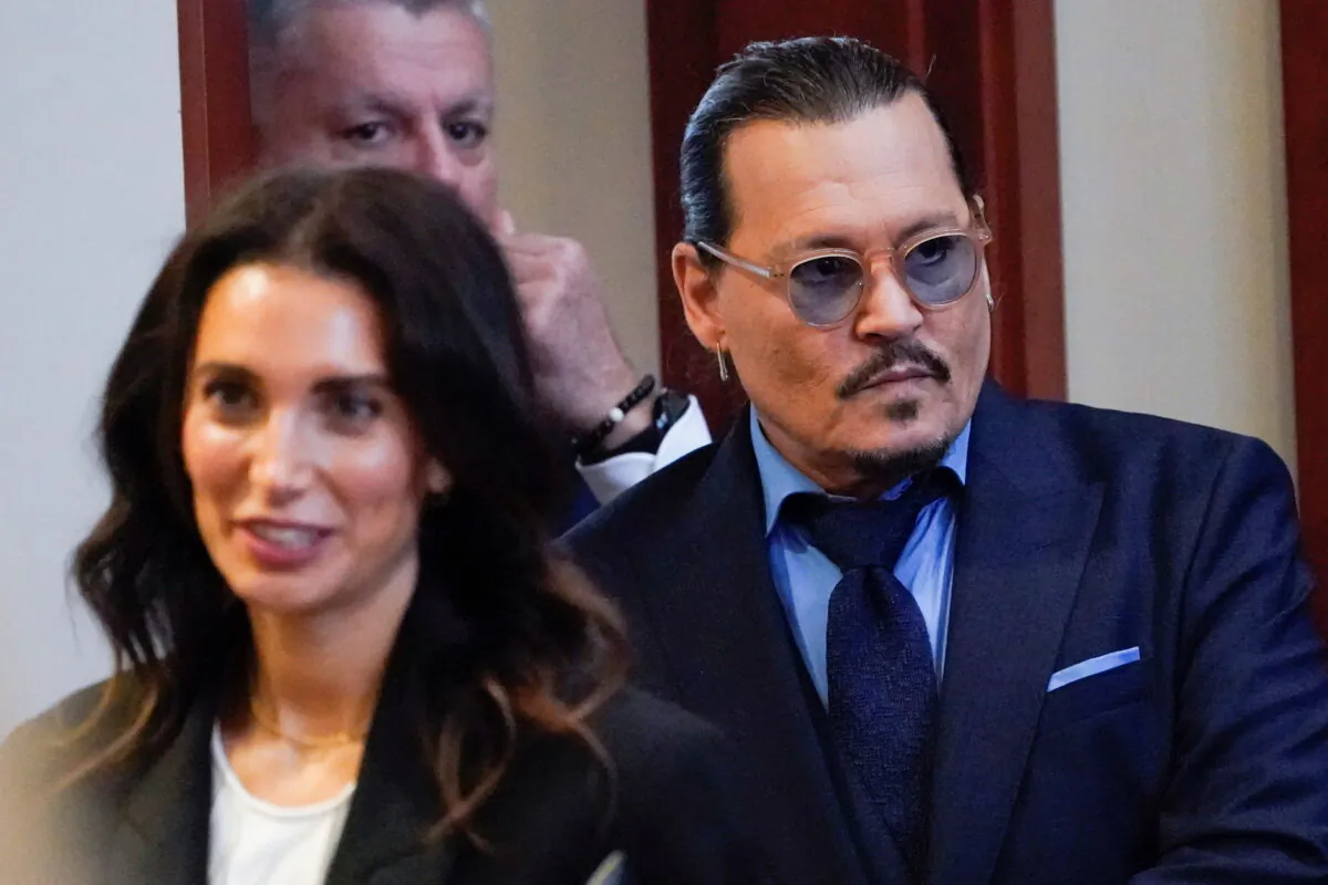 Actor Johnny Depp arrives in the courtroom for closing arguments in his defamation case against his ex-wife Amber Heard, at the Fairfax County Circuit Courthouse in Fairfax, Va., on May 27, 2022. (Steve Helber/Pool via Reuters)