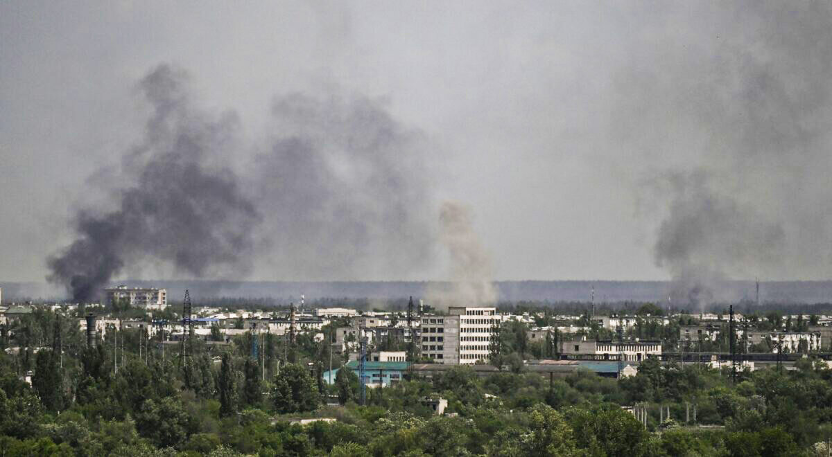 Smoke and dirt rise from the city of Sievierodonetsk
