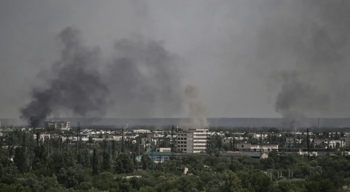 Smoke and dirt rise from the city of Sievierodonetsk, during shelling in the eastern Ukrainian region of Donbas, on May 26, 2022, amid Russia's military invasion launched on Ukraine. (Aris Messinis/AFP via Getty Images)