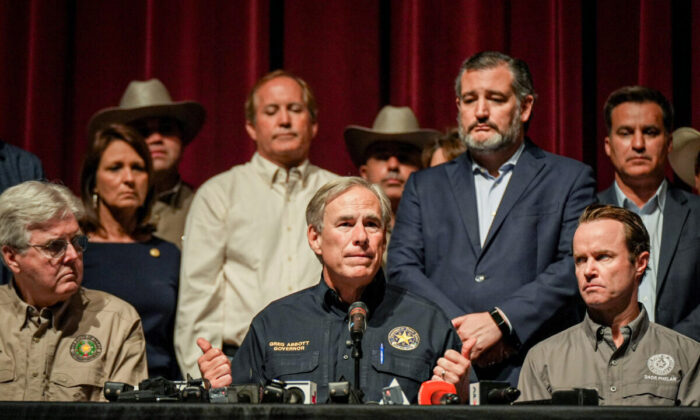 Texas Gov. Greg Abbott speaks at a press conference with federal, state, and local officials a day after a mass shooting at an elementary school, in Uvalde, Texas, on May 24, 2022. (Charlotte Cuthbertson/The Epoch Times)
