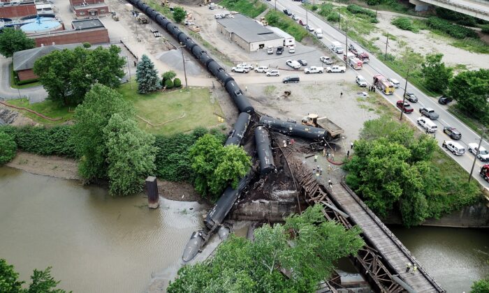The scene of a derailed freight train that dumped several train cars into the Allegheny River in Harmar, Penn., on May 26, 2022. (Matt Freed/Pittsburgh Post-Gazette/TNS)