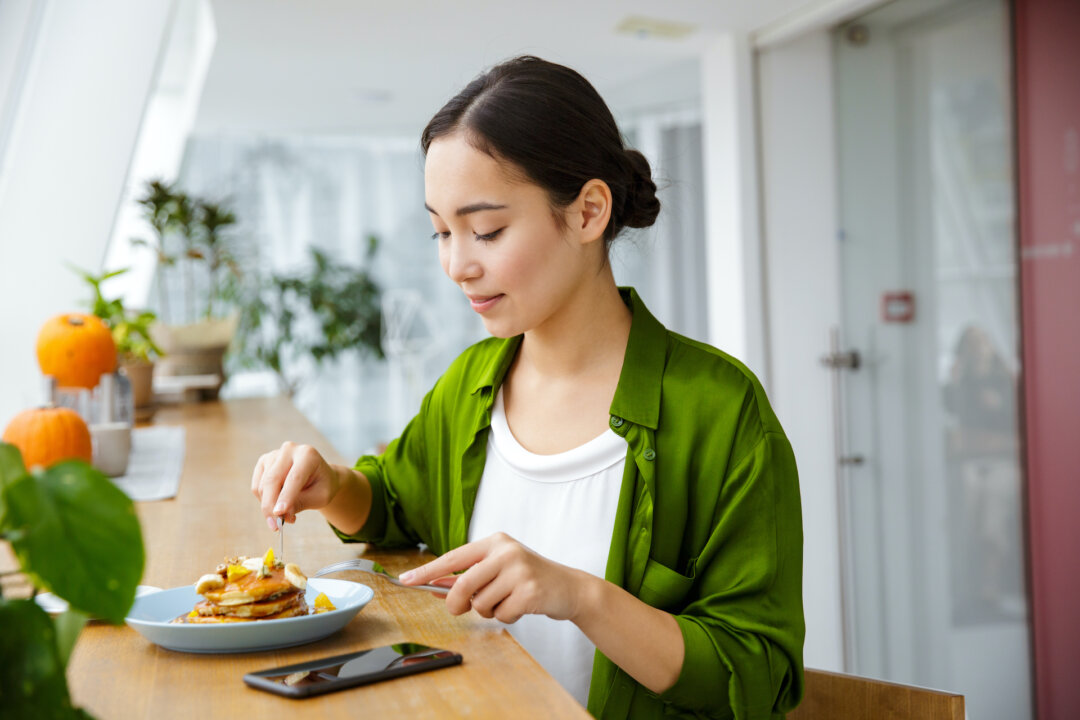 Studies suggest that chewing thoroughly and eating more slowly help maintain a healthy weight. (Dean Drobot/Shutterstock)