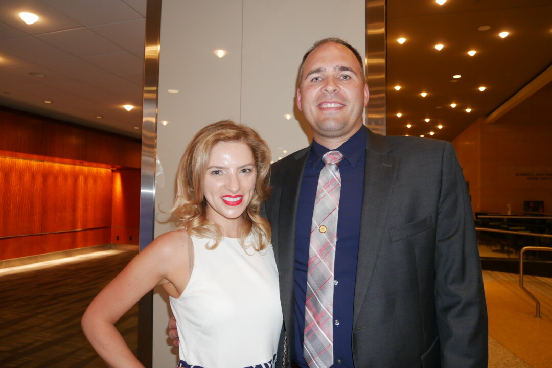 Lucas Fischhaber and wife Shauna at the DeVos Performance Hall in Grand Rapids, Mich., on May 27, 2022. (Sherry Dong/The Epoch Times)