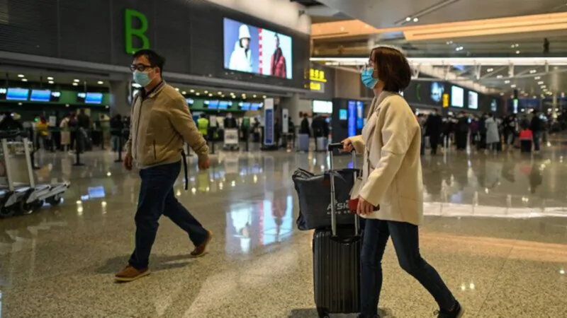 The Chinese Communist authorities enforcement of a strict Zero-COVID policy has triggered a wave of emigration. (Hector Retamal/AFP via Getty Images)