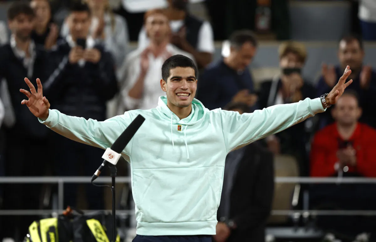 Spain's Carlos Alcaraz celebrates winning his third round match against Sebastian Korda of the United States at the French Open in Paris on May 27, 2022 .(Yves Herman/Reuters)