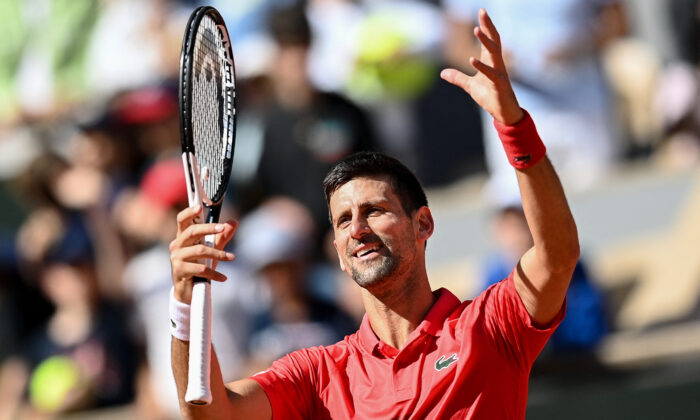 Serbia's Novak Djokovic reacts after winning against Slovenia's Aljaz Bedene during their men's singles match on day six of the Roland-Garros Open tennis tournament at the Court Philippe-Chatrier in Paris on May 27, 2022. (Christophe Archambault/AFP via Getty Images)