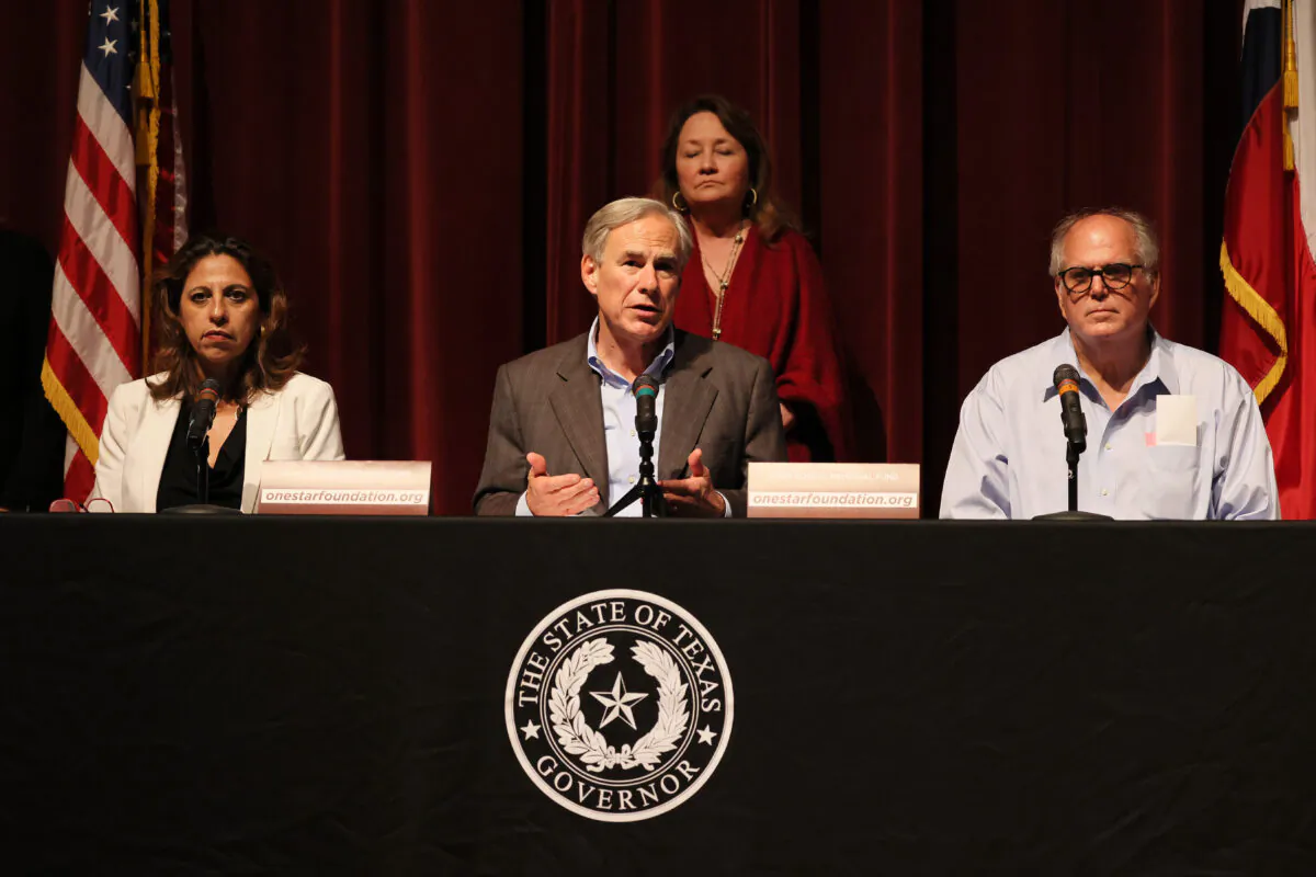 Texas Gov. Greg Abbott speaks during a press conference about the mass shooting as he sits with Christina Mitchell Busbee, 38th Judicial District Attorney and Mayor Don McLaughlin at Uvalde High School in Uvalde, Texas, on May 27, 2022. (Michael M. Santiago/Getty Images)