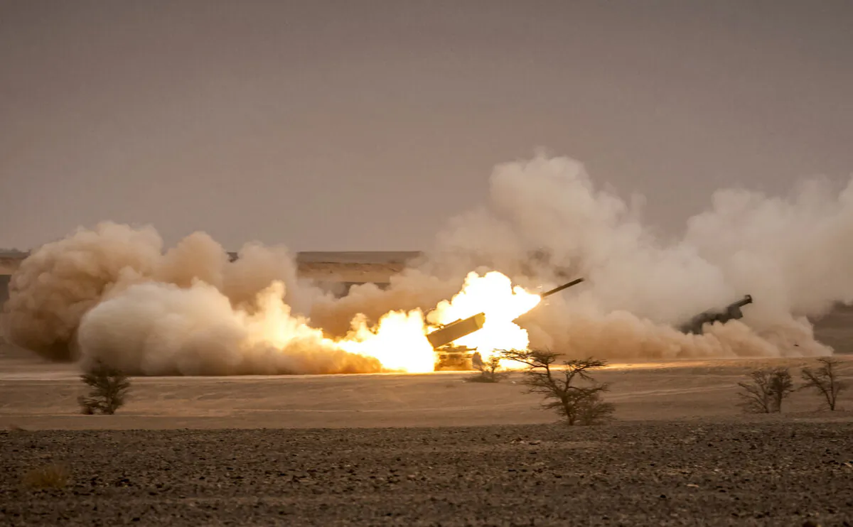 U.S. M142 High Mobility Artillery Rocket System (HIMARS) launchers fire salvoes during a military exercise in the Grier Labouihi region, in Morocco, on June 9, 2021. (Fadel Senna/AFP/Getty Images)
