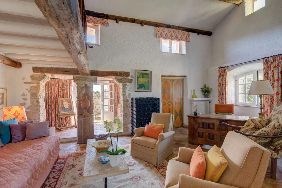 In all directions, earthy materials and brilliant stonework abound. Giant beamed ceilings give the impression of a fortress, which is softened by the warm and welcoming grounds. (The villa owners/Carlton International)