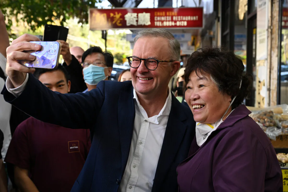 Australian Prime Minister Anthony Albanese during a street walk with his partner Jodie Haydon and the Member-elect for Bennelong, Jerome Laxale, in Eastwood, Sydney, on May 28, 2022. (AAP Image/Dean Lewins)