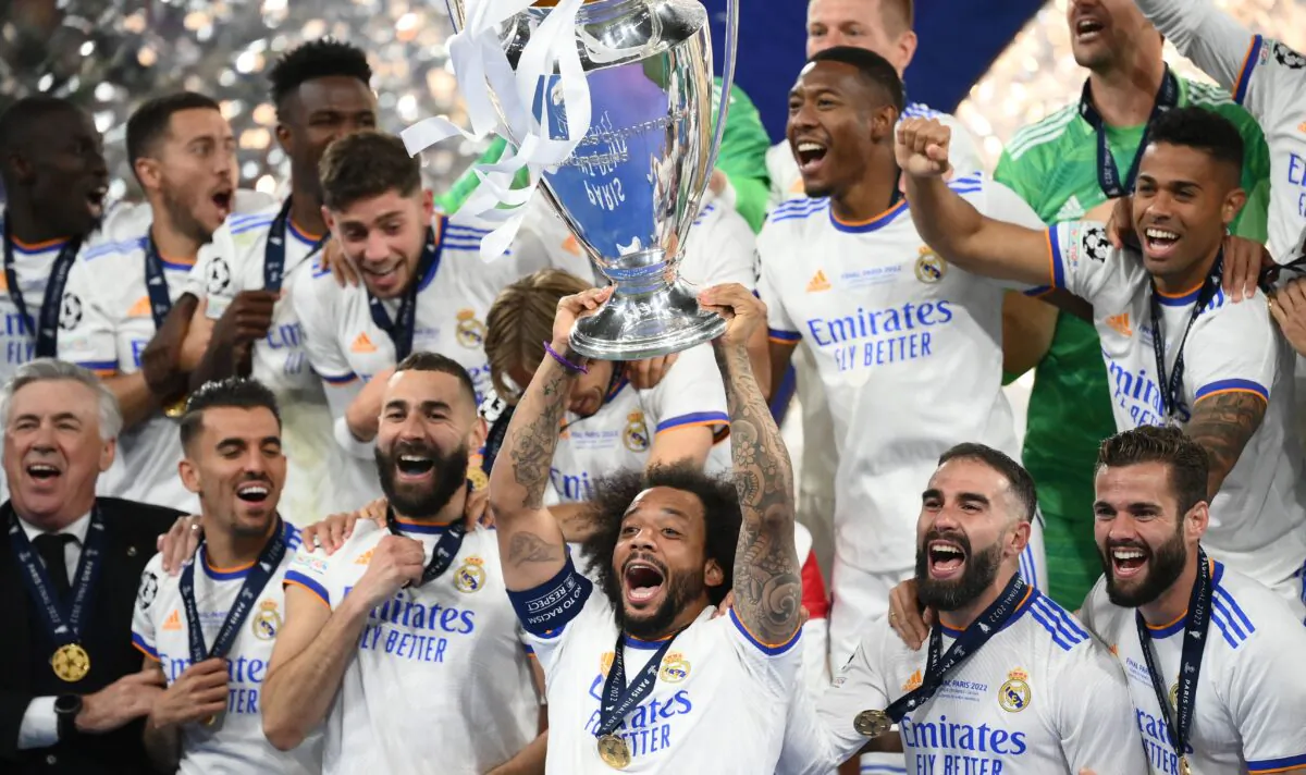 Real Madrid's Brazilian defender Marcelo (C) lifts the The Champions League trophy after Madrid's victory in the UEFA Champions League final football match between Liverpool and Real Madrid at the Stade de France in Saint-Denis, north of Paris, on May 28, 2022. (Franck Fife/Getty Images)