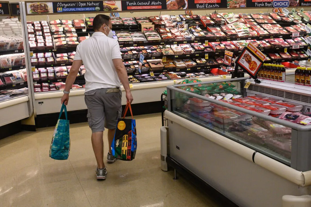 A person shops in a supermarket in Washington, on May 26, 2022. (Nicholas Kamm/AFP via Getty Images)