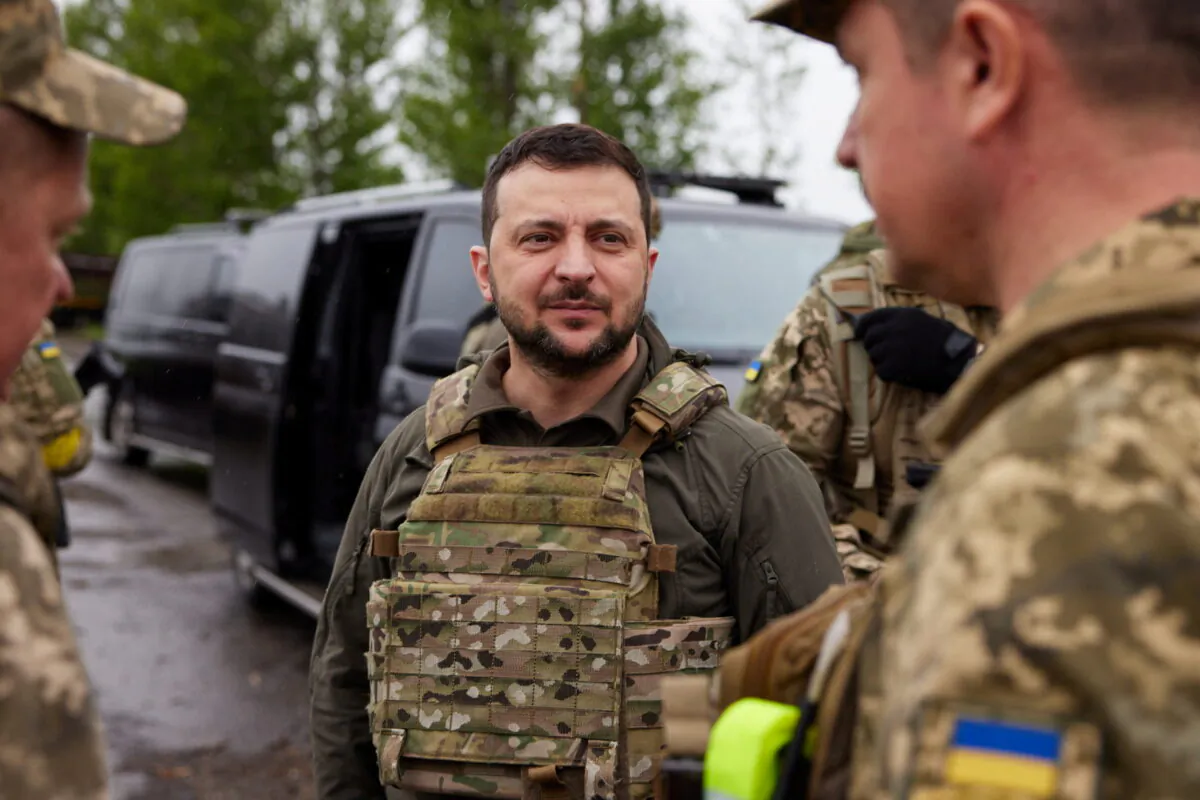 Ukraine's President Volodymyr Zelenskyy visits a place where a fight with Russian troops occurred in the Kharkiv region of Ukraine on May 29, 2022. (Ukrainian Presidential Press Service/Handout via Reuters)
