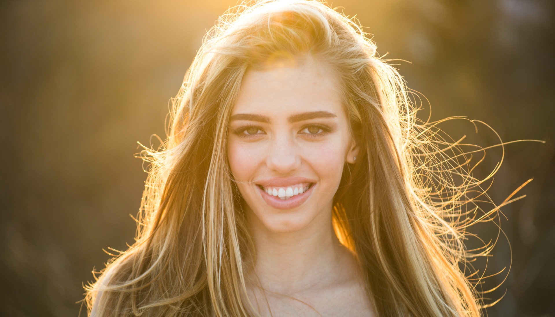 woman with long layered haircut