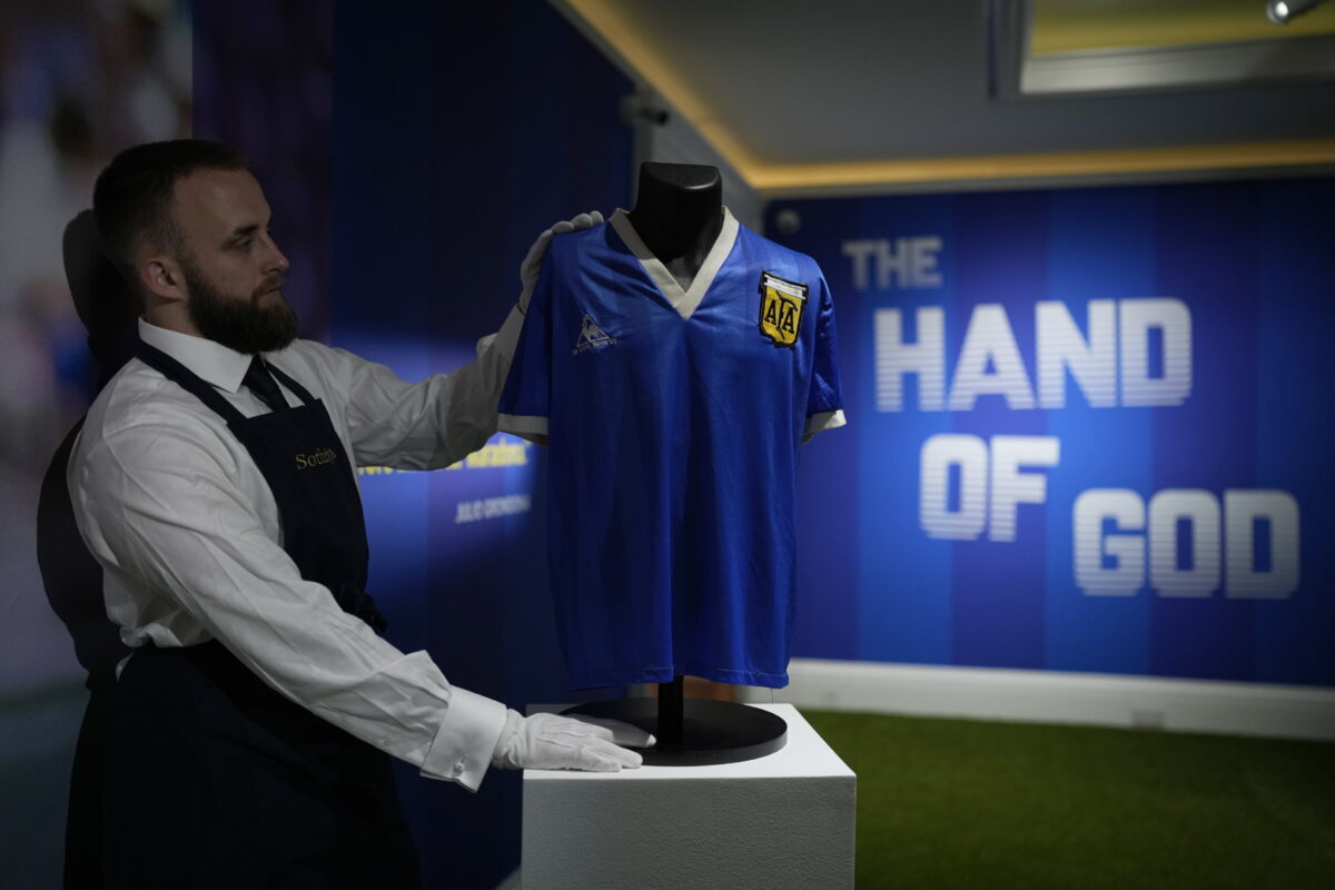 The Argentina football shirt worn by Diego Maradona in the 1986 Mexico World Cup quarterfinal soccer match between Argentina and England, is displayed 