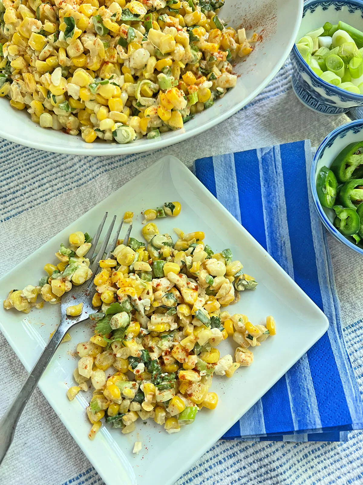 Elote, or Mexican street corn, is made savory with feta, mayonnaise and a sprinkle of smoked paprika. (Gretchen McKay/Pittsburgh Post-Gazette/TNS)