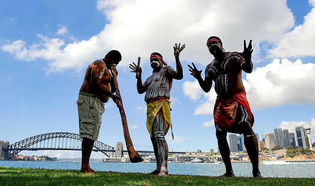 Kooma Aborigines (L to R) Lez Beckett, Ronnie Guivarra and Les Daniel dance for the first time in two centuries on Goat Island, or Mel-Mel in Sydney Harbour on April 18, 2010. (TORSTEN BLACKWOOD/AFP via Getty Images)