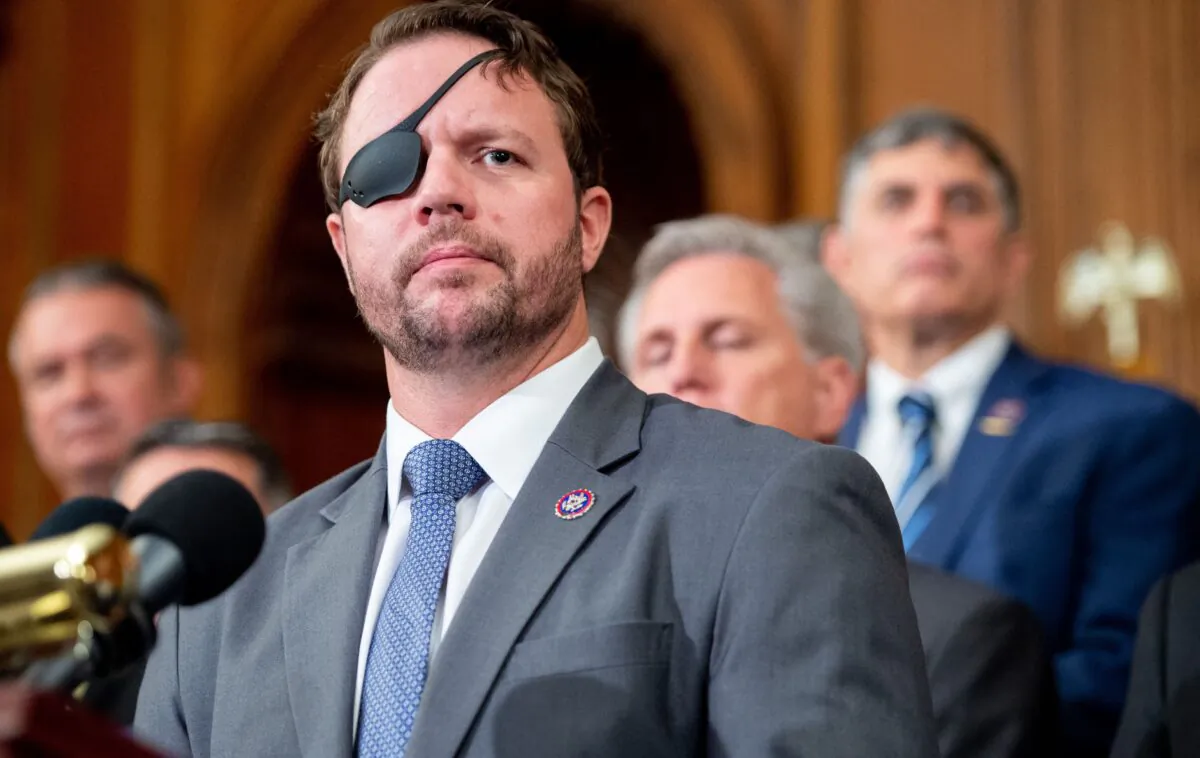 Rep. Dan Crenshaw (R-Texas) speaks during a press conference in Washington on Aug. 31, 2021. (Saul Loeb/AFP via Getty Images)