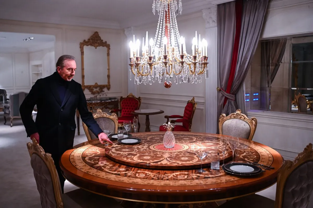 Renato Pologna, owner of furniture company OAK Industria Arredamenti, shows a product in the headquarters showroom in Cantu, near Como, Italy on Feb. 17, 2022. (PIERO CRUCIATTI/AFP via Getty Images)