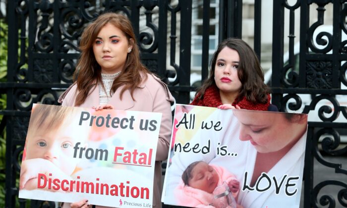 Pro-life, anti-abortion activists hold placards as they protest outside of Belfast High court in Belfast, Northern Ireland, UK, on Jan. 30, 2019. (Paul Faith /AFP via Getty Images)