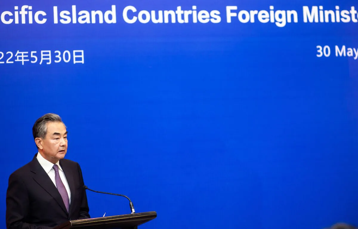 Chinese Foreign Minister Wang Yi speaks during a joint press conference with Fijian Prime Minister Frank Bainimarama (not pictured) in Fiji's capital city, Suva, on May 30, 2022. (Leon Lord/AFP via Getty Images)