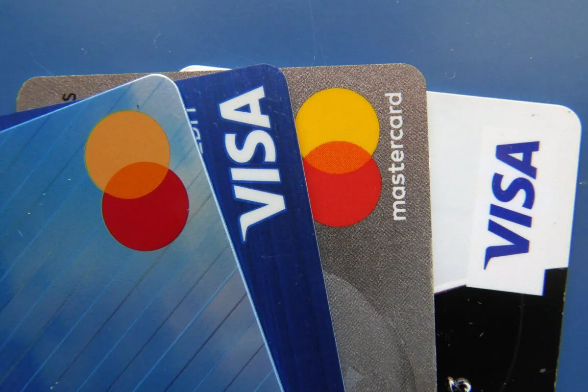 Credit cards charge merchants so-called interchange rates on purchases, a fee shared between credit-card companies, payment processors, and banks. (AP/John Raoux)