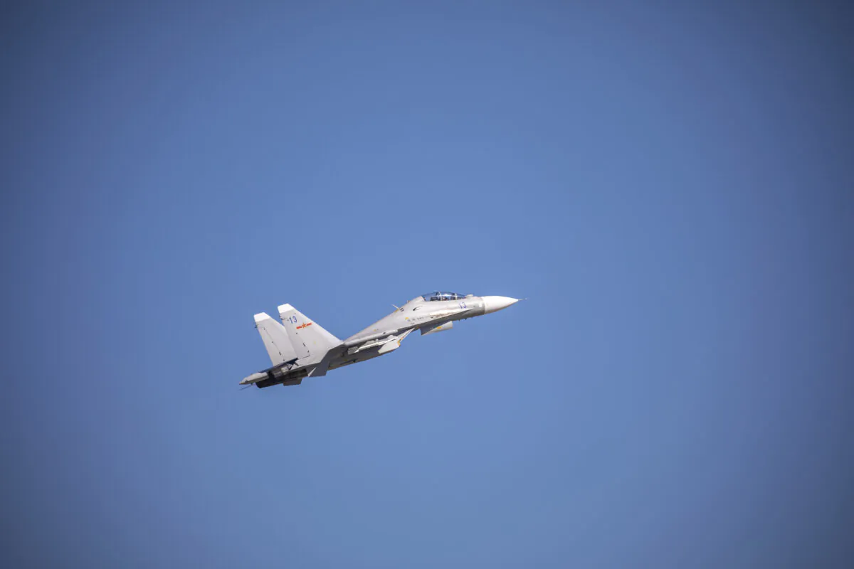 A J-11 air fighter takes off from a PLA military airport during a training session in east China's Zhejiang Province on Aug. 27, 2021. (Feature China/Future Publishing via Getty Images)