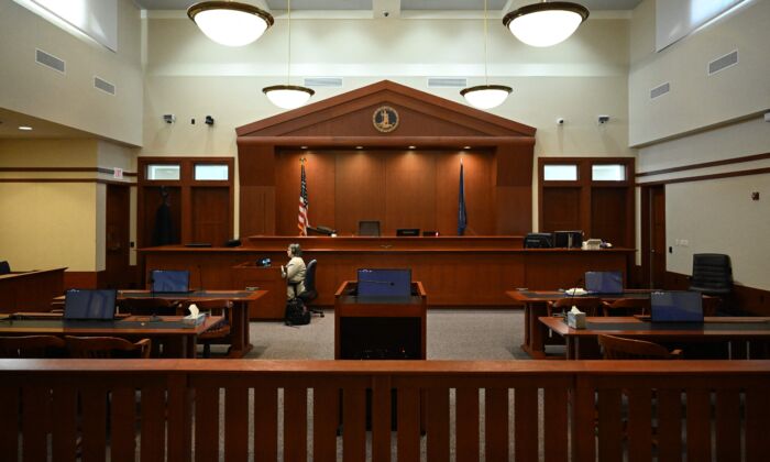 In trials jurors are told: Don't conduct your own research, don't discuss the case with anyone—not even fellow jurors. (Jim Watson/Pool/AFP via Getty Images)