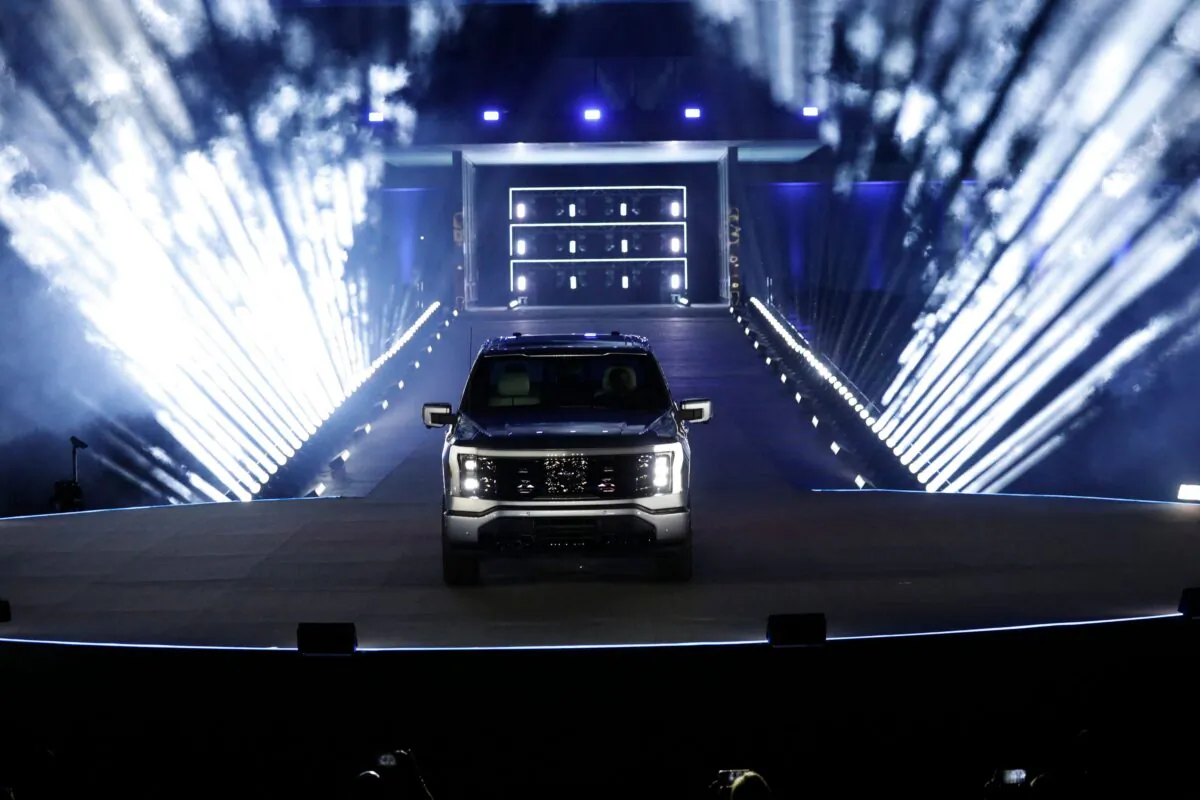Ford Motor Company unveils its new electric F-150 Lightning outside Ford headquarters in Dearborn, Mich., on May 19, 2021. (Jeff Kowalsky/AFP via Getty Images)