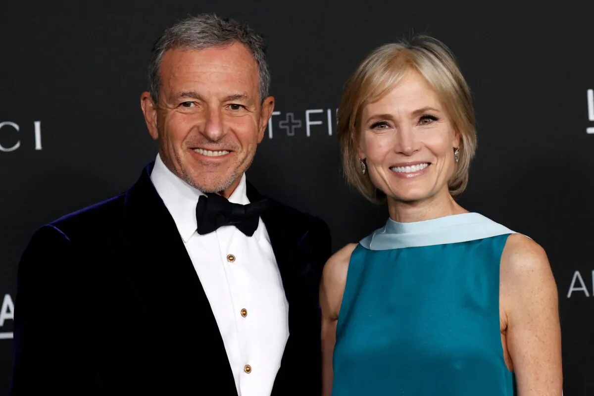 Chairman of the board, and former CEO of The Walt Disney Company Bob Iger (L) and wife Willow Bay arrive for the 10th annual LACMA Art+Film gala at the Los Angeles County Museum of Art (LACMA) in Los Angeles, Calif., on Nov. 6, 2021. (Michael Tran/AFP via Getty Images)
