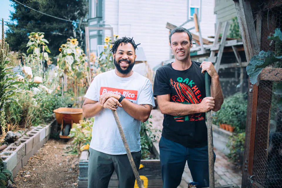 Seneca Scott (L) and Jason Byrnes (R) on a work day in Bottoms Up Garden on Sept. 12, 2019. (Courtesy of Tiana McGuire)