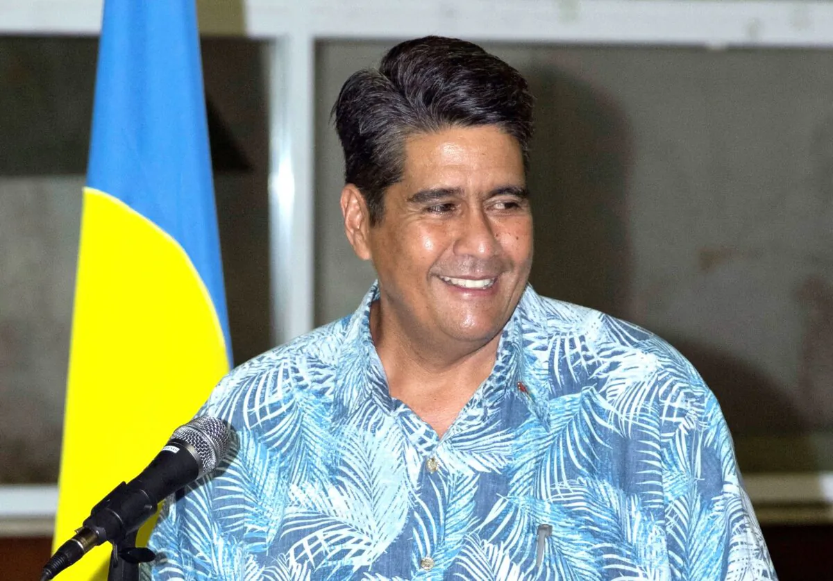 Palau President Surangel Whipps speaks as he greets tourists from Taiwan during their arrival in Koror after Taiwan and Palau launched a rare holiday travel bubble as the two diplomatic allies try to kickstart their battered tourist industries after successfully keeping COVID-19 infections at bay on April 1, 2021. (Richard W. Brooks/AFP via Getty Images)