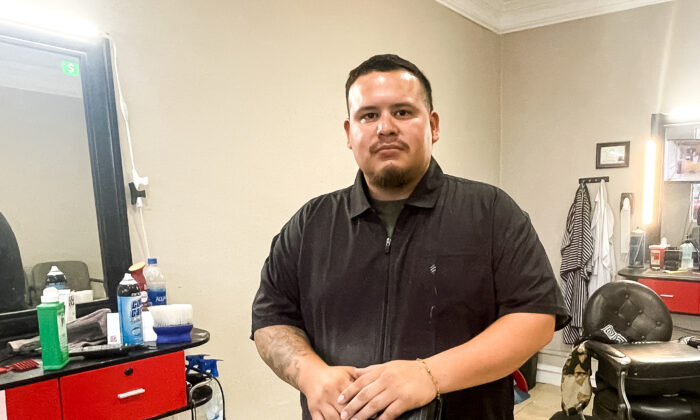 Steve Mena, owner of Official Cuts, in his barber shop in Uvalde, Texas, on May 31, 2022. (Charlotte Cuthbertson/The Epoch Times)