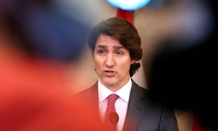 Canada's Prime Minister Justin Trudeau speaks at a press conference on Parliament Hill in Ottawa, Canada, on Feb. 14, 2022. (Dave Chan/AFP via Getty Images)