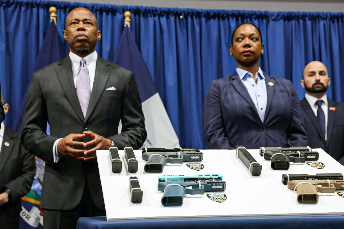 New York City Mayor Eric Adams and New York City Police Commissioner Keechant Sewell attend a news conference with New York Attorney General Letitia James and others to announce a new lawsuit against "ghost gun" distributors in New York City, on June 29, 2022. (Spencer Platt/Getty Images)
