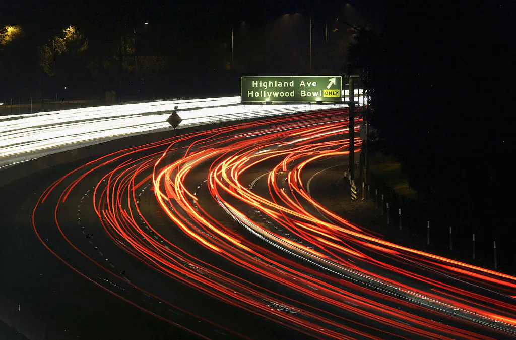 Traffic moves along the 101 freeway near Hollywood in Los Angeles on June 14, 2004. (David McNew/Getty Images)