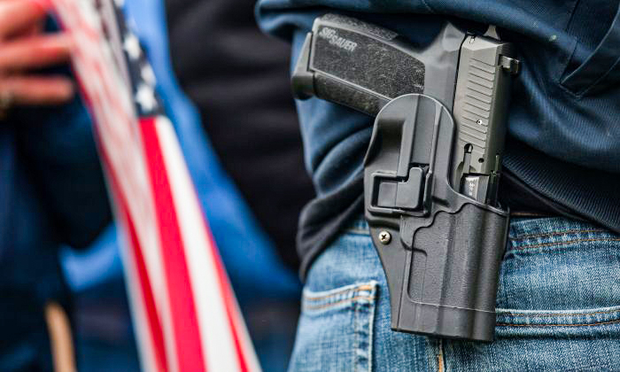 A handgun in a holster in a file photo. (David Ryder/Getty Images)