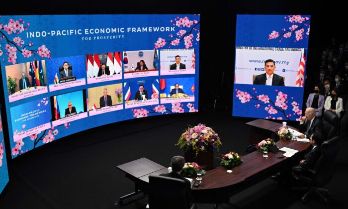 U.S. President Joe Biden and Japanese Prime Minister Fumio Kishida attend the Indo–Pacific Economic Framework for Prosperity with other regional leaders via video link at the Izumi Garden Gallery in Tokyo on May 23, 2022. (Saul Loeb/AFP via Getty Images)