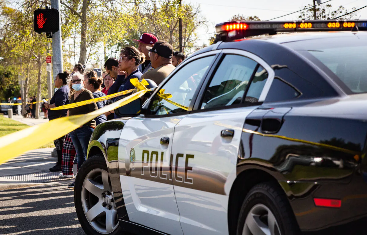 First responders secure Santa Ana High School as parents and family members wait for students on lockdown after threats against the school in Santa Ana, Calif., on March 10, 2022. (John Fredricks/The Epoch Times)