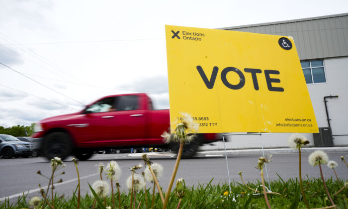 A vote sign is displayed outside a polling station during advanced voting in the Ontario provincial election in Carleton Place, Ont., on May 24, 2022. (The Canadian Press/Sean Kilpatrick)