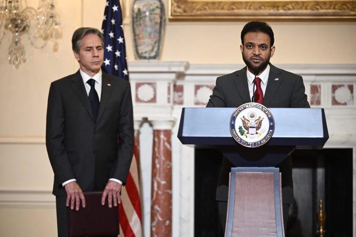 Ambassador at Large for International Religious Freedom Rashad Hussain, with Secretary of State Antony Blinken, speaks about about the 2021 International Religious Freedom Report, in the Franklin Room of the State Department in Washington, on June 2, 2022. (Brendan Smialowski/AFP via Getty Images)