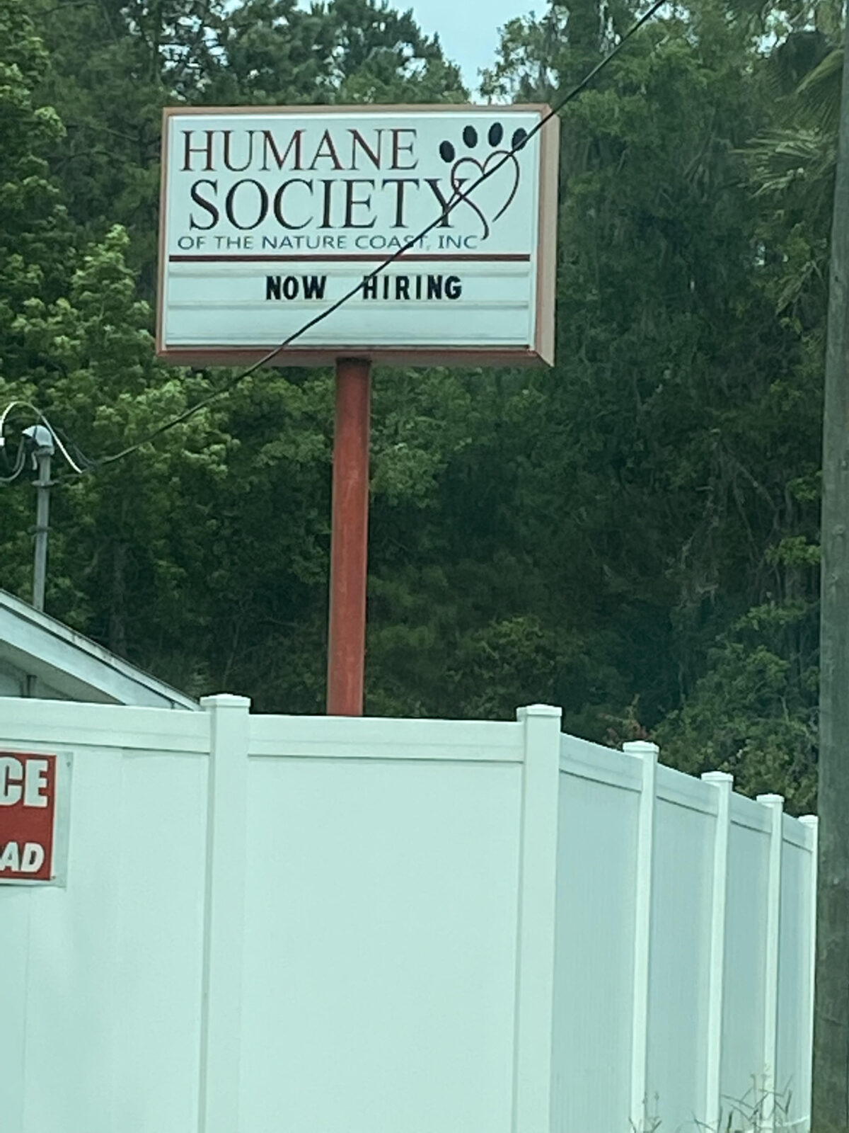 The sign at the Humane Society of the Nature Coast in Brooksville, Florida announces they are hiring. 