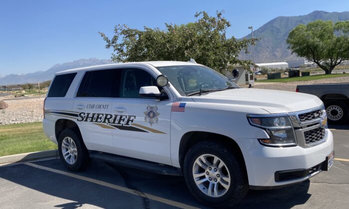 A Utah County Sheriff's Office cruiser sits parked at the public safety complex in Spanish Fork, Utah, on June 27, 2022. (Allan Stein/The Epoch Times)